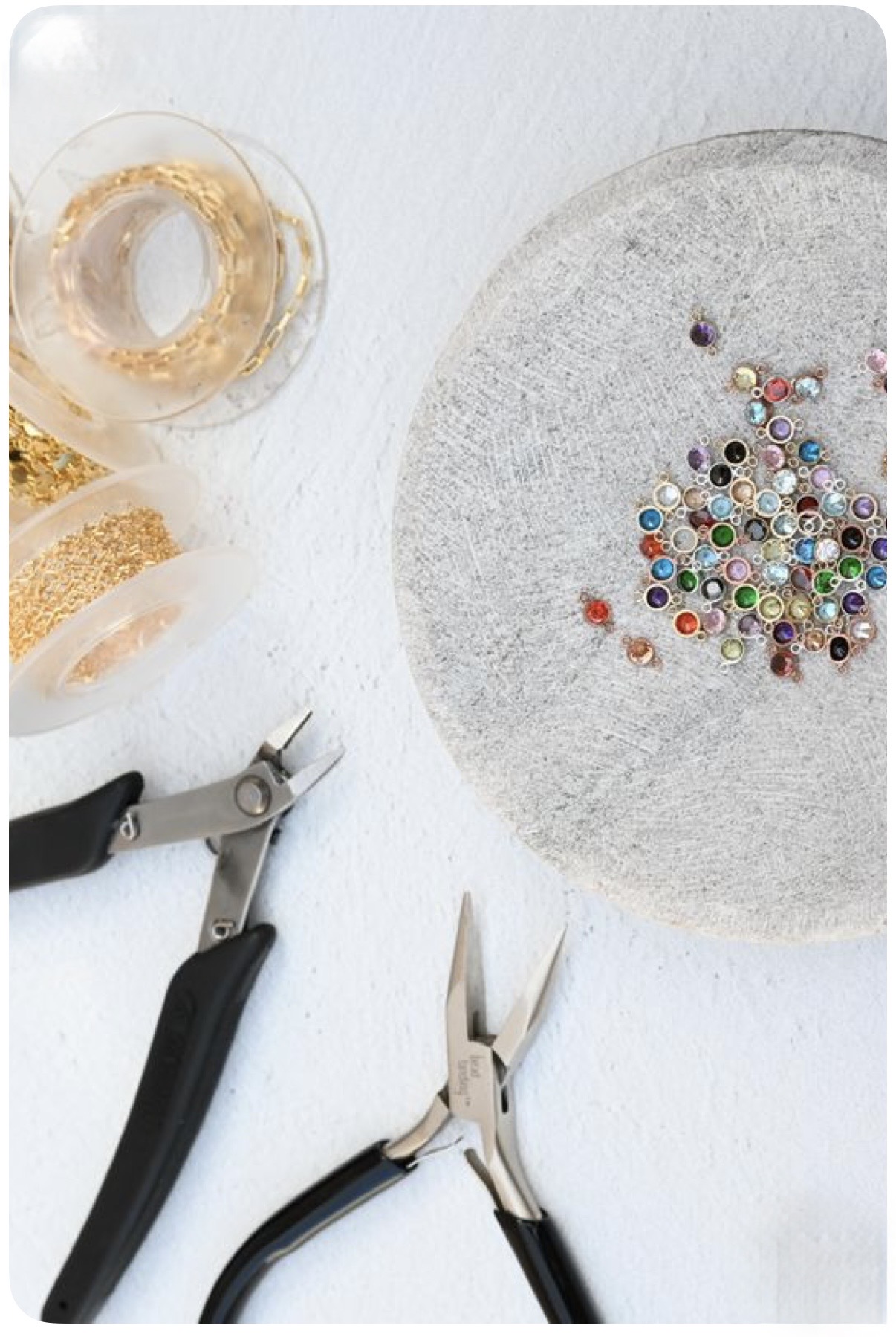 Colorful charms and jewelry tools